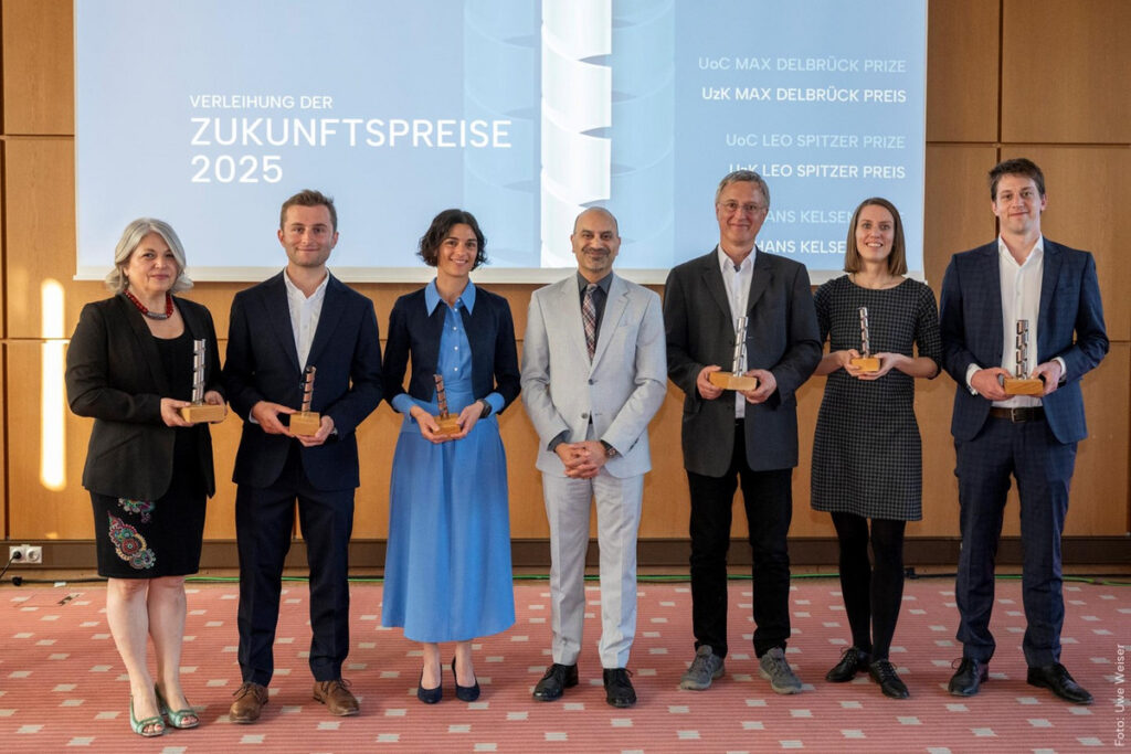 leo spitzer prize recipient thomas widlok alonside the rector of the University of cologne and the other prize recipients