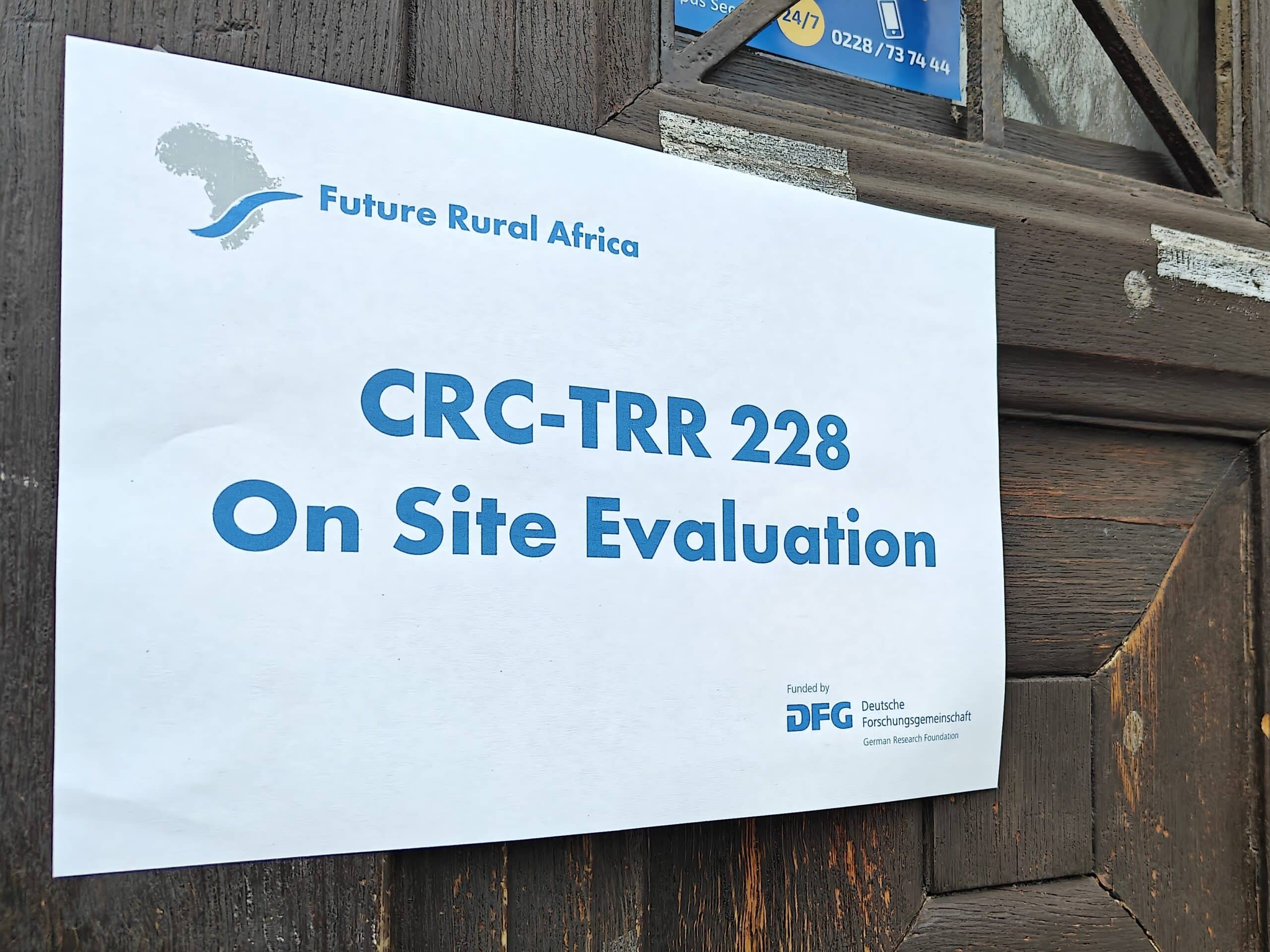 photograph of a sign that reads "crc-trr 228 on site evaluation"