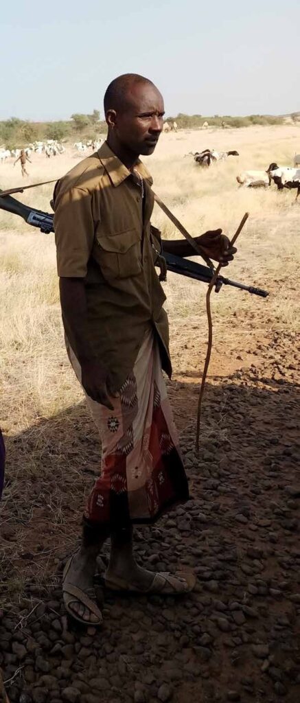B03 Violent Futures 2 Northern Rangeland herder on carbon sits